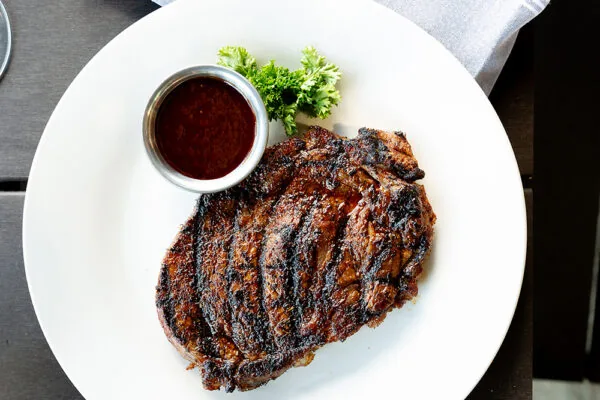 Blackened ribeye steak from The Corner Grille.